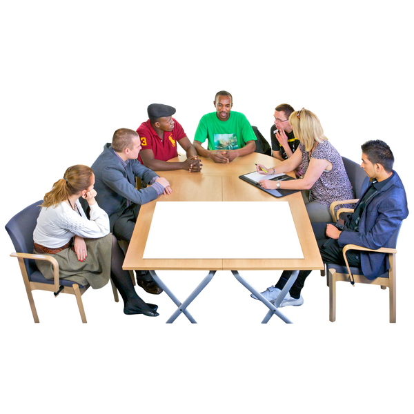 A group of people sit around a table having a meeting