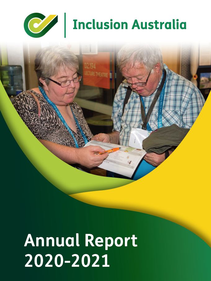 Inclusion Australia annual report from cover, showing a aman and a woman looking at a brochure
